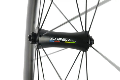 Close-up of Beast 700C Road Carbon Wheelset With 50mm Deep Section, 23mm Clincher, R7 Hub showing hub and spokes.