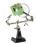 Hands Free Soldering Gear With Magnifier 4X Loupe Alligator Clamps With 4 Way Swivels holding small circuit board