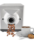 Heavy Duty Electric Coffee Roaster Machine With 360 Degree Even Roasting And Precise Temp Control For Knockout Flavors In Large Batches Of Beans Nuts And Grains No Sweat Operation For Kitchen Or Business with coffee and cookie