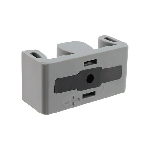 Close-up of a framed sliding shower door bumper, silicone and plastic protector with center hole, grey color.