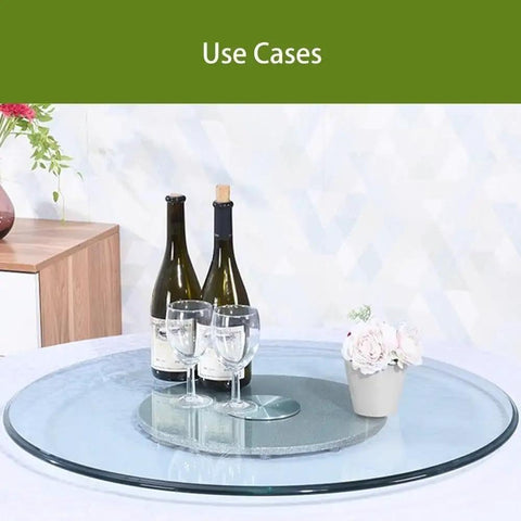 Round Glass Lazy Susan With Hella Sturdy Thickened Base For Dining Tables Heavy Duty Heat Resistant Serving Tray with wine bottles and glasses.
