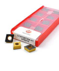 Hopson Tools CCMT carbide turning inserts set, 10 pcs, gold and black square inserts beside red storage box