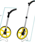 Heavy Duty Digital Distance Measuring Wheel With 12 Inch Wheel And Large LCD Display measures from 19 to 38 inches, showing telescoping handle.