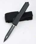 Compact Pocket Hunting Knife With Glass Breaker For Camping And Survival Ready Gear, black handle with clip displayed.