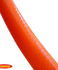 Close-up of Orange 3/8 Inch Air Hose, 50 Ft With 1/4 Inch MNPT Fittings, PVC Reinforced By Polyester Yarn, smooth texture visible.