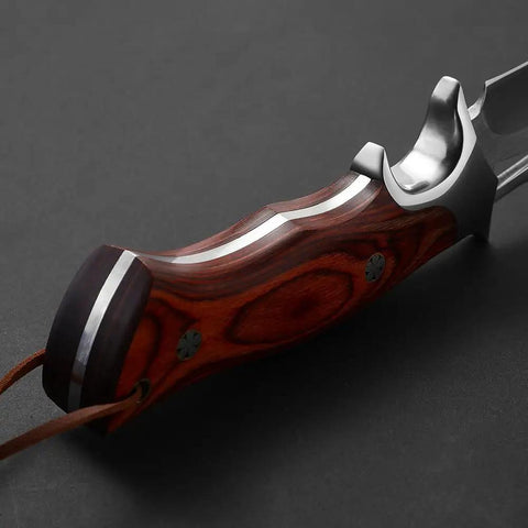 Close-up of the non-slip red wooden handle on the M390 Fixed Blade Hunting Knife With Leather Sheath, full tang bushcraft knife