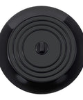 Bathtub Drain Stopper 6 Inches Silicone Rubber Plug, Black top view of flat design with circular grooves and central button.
