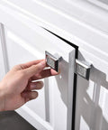 Hand installing Square Cabinet Handles And Crystal Knobs With All Metal Drawer Pulls Bling Bling Chrome Finish on white cabinet door