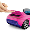 Fingers opening hidden trunk of Remote Control Pink Convertible RC Toy Car With Dual Driving Modes For Storytelling Or Fast Action.