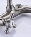 Kitchen Wall Faucet With Two Cross Handles In Brushed Nickel Finish Wall Mounted And Adjustable Spread From Three To Nine Inches