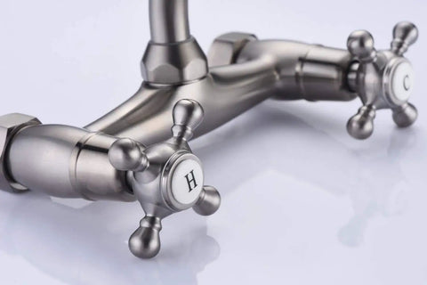 Kitchen Wall Faucet With Two Cross Handles In Brushed Nickel Finish Wall Mounted And Adjustable Spread From Three To Nine Inches