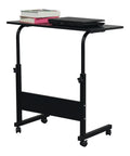 Slick Rolling Adjustable Height Computer Desk With Secure Locking Casters Heavy Duty Steel Frame And Scratch Resistant Top Mobile Standing Laptop Workstation For Tight Home Offices in black, with books and laptop.