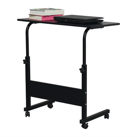 Slick Rolling Adjustable Height Computer Desk With Secure Locking Casters Heavy Duty Steel Frame And Scratch Resistant Top Mobile Standing Laptop Workstation For Tight Home Offices in black, with books and laptop.