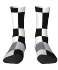 Upgrade Your Fit With Black And White Piano Grid Print Socks For Men And Women Moisture Wicking Polyester Crew Socks showing black and white checkered pattern