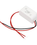Built Tough AC DC Power Supply Module 5V 1A 5W Step Down Converter with red and black wires for electrical connections.