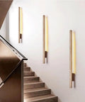 Linear Wall Sconce Wood Grain Strip Wall Light Slim Vertical Lamp Modern Minimalist Fixture Warm Lighting for Bedroom Living Room Hallway Background Wall Decor on stairwell wall.