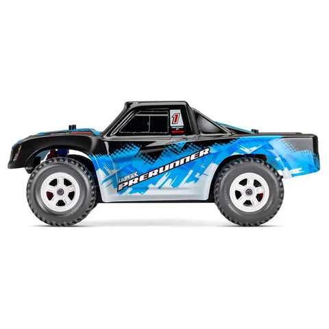 Side view of the LaTrax Desert Prerunner 1 By 18 Scale 4WD Electric Truck RTR Blue Beast, showing rugged design and blue graphics.
