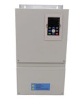 Beefy 380V Ac Variable Frequency Drive For Cnc Machines With Massive Heat Sink And Quiet Fan Delivering Killer Heat Dissipation Plus Smooth Speed Control For Low Noise Performance And Wide Range Use While Staying Rock Solid Under Heavy Loads. gray metal VFD with keypad and warning label