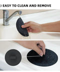 Heavy Duty Silicone Tub Stopper Two Pack Standard Six Inch Drain Plug in use, easily cleaning under water faucet.
