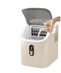 Portable Nugget Ice Maker Brings The Chill Producing 34 Pounds of Chewable Pebble Ice Daily, adding water to the machine.