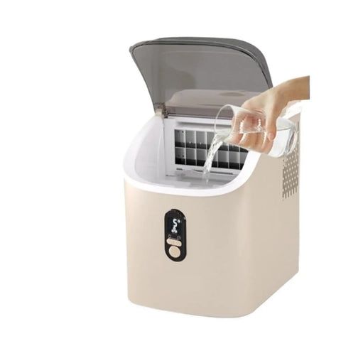 Portable Nugget Ice Maker Brings The Chill Producing 34 Pounds of Chewable Pebble Ice Daily, adding water to the machine.