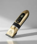 Hassle-Free Rechargeable Electric Hair Clippers For Dogs And Cats, gold cordless pet clipper with adjustable blade.