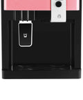 Close-up of the pink Hot And Cold Countertop Water Dispenser For 1-5 Gallon Bottles With Top Loading Design, showing the removable drip tray.