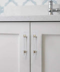 3.25 Inch Acrylic Clear Silver Drawer Pulls For Dresser Cabinets Lucite Knob Hardware With 83mm Center To Center Spacing installed on white cabinets