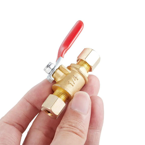 Brass ball valve shut-off with red lever; close-up view, 1/4" compression x 1/4" compression straight tubing fittings