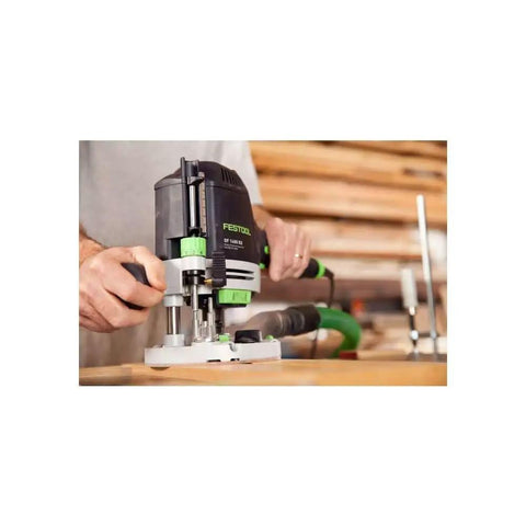 Using Plunge Router Of 1400 EQ-F-Plus With Ergonomic Grip for precise woodworking on a wooden surface.