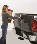 Woman using Tailgate Assist Kit For Ram 1500 2002 To 2008 And Ram 2500 3500 2003 To 2009 Easy Bolt On Install With Ready Thread Locked Nutsert