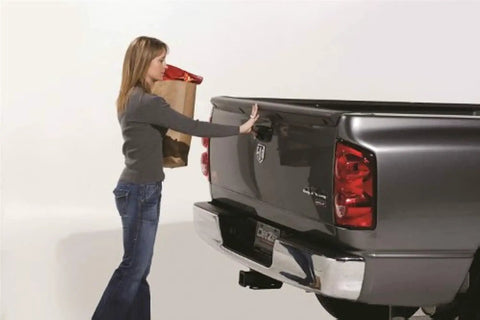 Woman using Tailgate Assist Kit For Ram 1500 2002 To 2008 And Ram 2500 3500 2003 To 2009 Easy Bolt On Install With Ready Thread Locked Nutsert