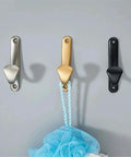 Sleek Wall Mount Coat Rack Built With Rock Solid Zinc Alloy Hooks Perfect For Mudrooms And Halls Secured to wall with a blue loofah.