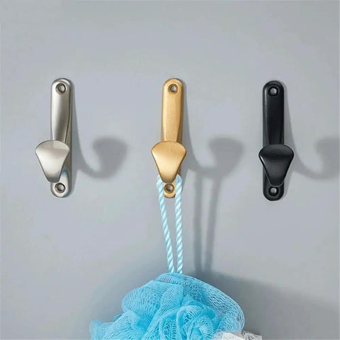 Sleek Wall Mount Coat Rack Built With Rock Solid Zinc Alloy Hooks Perfect For Mudrooms And Halls Secured to wall with a blue loofah.