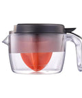 Primtronic Electric Citrus Juicer With Large 24 Oz Capacity And Seed Filter Auto Reverse Function Compact Design For Oranges Lemons Limes BPA Free Black Orange side view with orange cone.