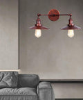 Badass Industrial Vintage Dual Light Wall Sconce Featuring Adjustable Metal Arms For Instant Room Upgrades Rock Solid Construction Easy Install In Stunning Chrome Or Sleek Matte Black Finishes Today in a modern living room.