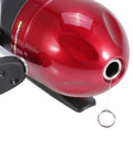 Close-up of a Closed Face Spin Cast Fishing Reel With 2.6 To 1 Gear Ratio And Pre Spooled Line, showing red plastic casing and metal components.