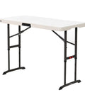 Commercial Adjustable Folding Table For Indoor And Outdoor Use 4 Foot Surface With Solid Seamless Top Height Settings Of 24 29 And 34 Inches Lightweight Durable HDPE Top With Powder Coated Steel Frame Almond, side view