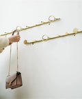 Modern Wrought Iron Coat Hook With Gold Finish Space Saving Wall Mount For Entryway And Porch Smooth Rounded Design Rust Resistant