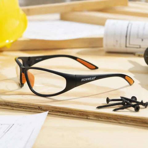 Bradford 3030 Series Nylon Protective Safety Glasses with 2.0 Bifocal Lens and Clear Lens Black Frame on workspace with screws