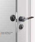 Solid Wall Door Bumper Stop With Thick 1 1/8 Inch Rubber Cushion And Matte Black Metal Shield Keeps Door Handles Off Painted Walls Quick Screw Mount Hardware Upgrade For Any Home Space close-up of door handle with matte black finish.