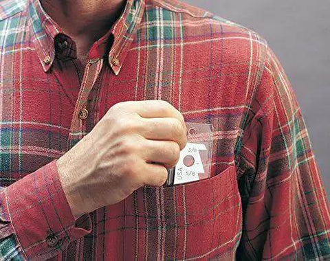 Man placing A40 USA Made Sheet Metal Scriber With Five Teeth Delivers Ten Scribing Depths, Pocket Ready Compact Tool into shirt pocket