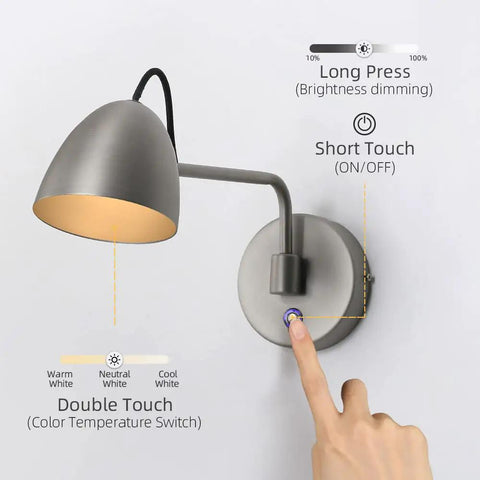 Swing Arm Wall Sconce With Touch Control Dimmable 10 To 100 Percent And 3 Color Temperatures 3000K 4500K 6000K Aluminum Brushed Nickel LED Reading Wall Lamp Hard Wired For Living Room And Bedroom with hand touching control button.