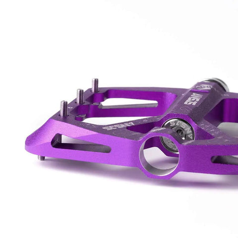 Close-up of Grippy Aluminum Flat Pedals With Ultra Traction Pins And Sealed Bearings, Lightweight Platform Pedals, Purple A001, 100mm wide