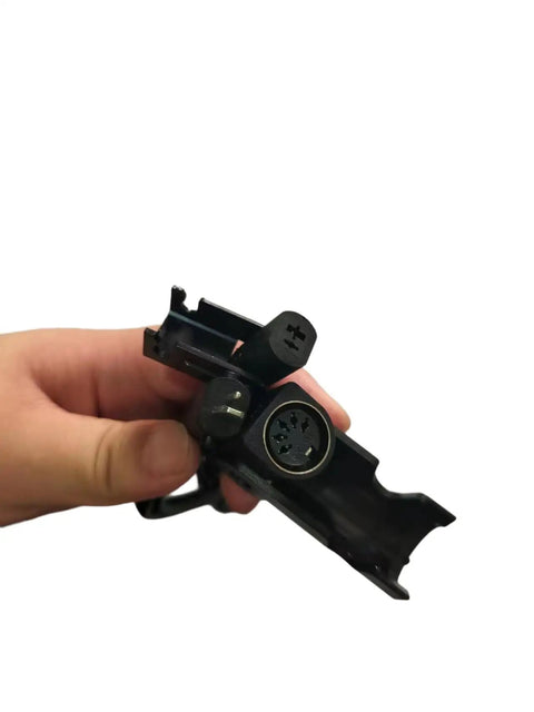 Person holding Power Recliner Motor Replacement With Cord KDPT007-113 Linear Actuator connector, close-up view.