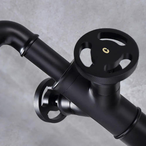 Close-up of Industrial Pipe Vessel Sink Faucet Matte Black 1-Hole 2-Handle Solid Brass Bathroom Faucet with High Arc Spout