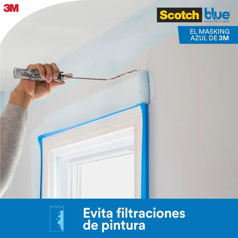 Person painting wall edge with Blue Painters Tape For Multi Surface Use Easy Peel Damage Free Masking Tape For Indoor And Outdoor Projects Removable Up To Two Weeks Great For DIYers And Pros Alike Helping You Get Sharp Edges And Clean Lines On Walls Cabinets.