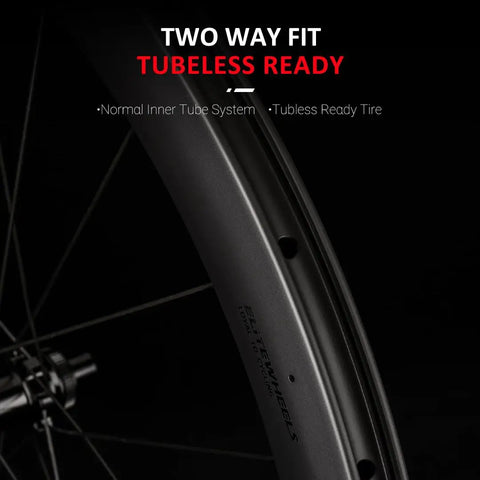 Close-up of 700C Carbon Disc Brake Wheelset With 55mm Profile And 31mm Width, Tubeless Ready Clinchers, Two Way Fit.