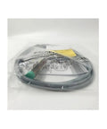 NBN4 12GM60 WS Proximity Switch Sensor packaged, showing cable coil and plug for industrial automation use