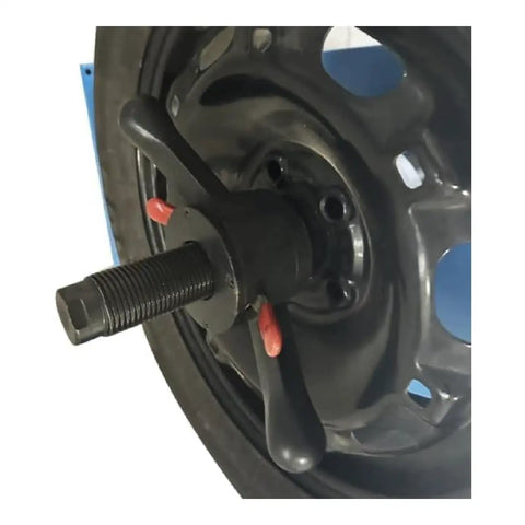 Close-up of a Heavy Duty Wheel Balancer Machine Built With Raw Copper Motor Core and Lab Grade Precision for tire mounting.